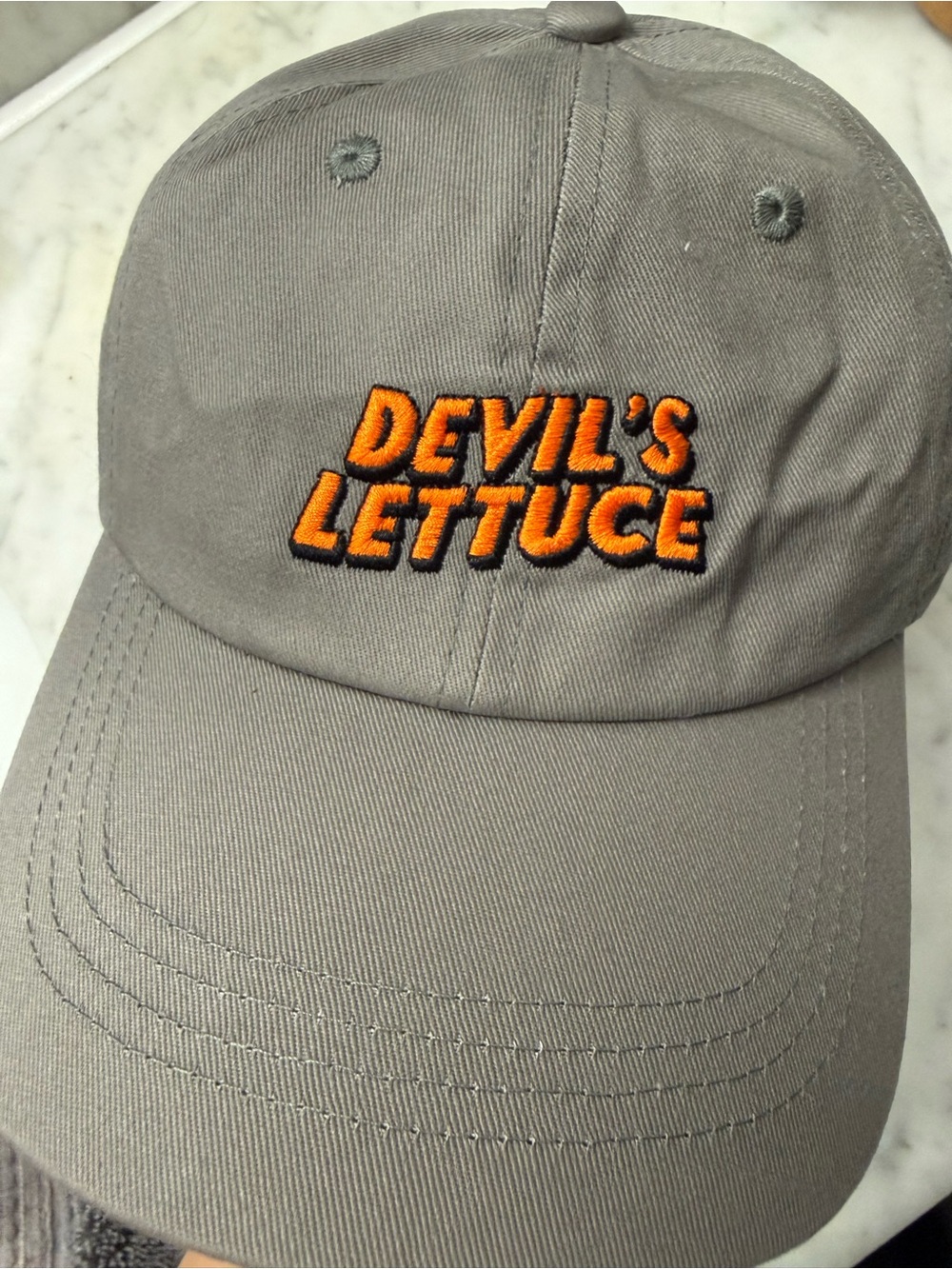Gray Baseball Cap with Orange "Devil's Lettuce" Embroidery